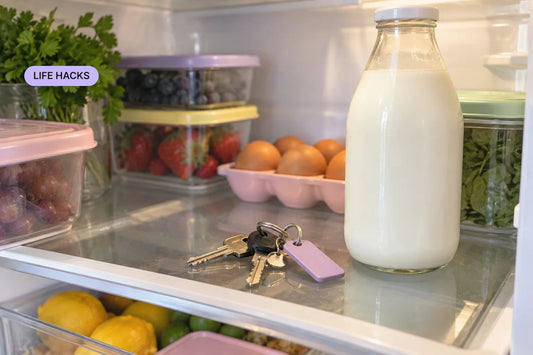 House keys left on a fridge shelf next to a bottle of milk — cover for “Life Hacks for When Your Brain Has Left the Building”
