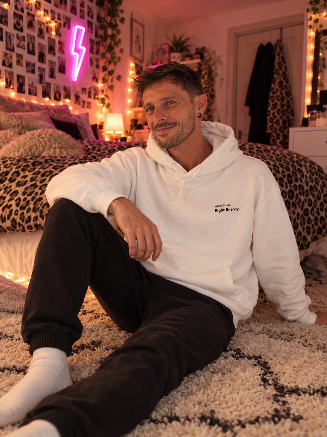 Man wearing the Wrong Spoon. Right Energy. embroidered hoodie in White