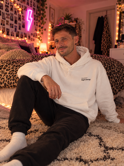 Man wearing the Wrong Spoon. Right Energy. embroidered hoodie in White