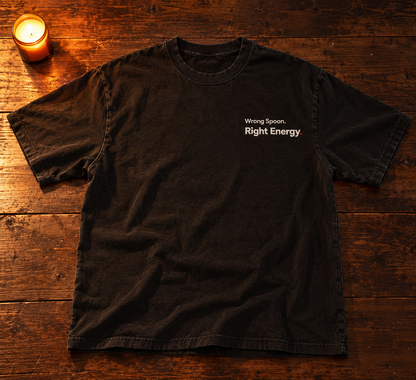 Wrong Spoon. Right Energy. embroidered oversized tee in Washed Black, laid flat