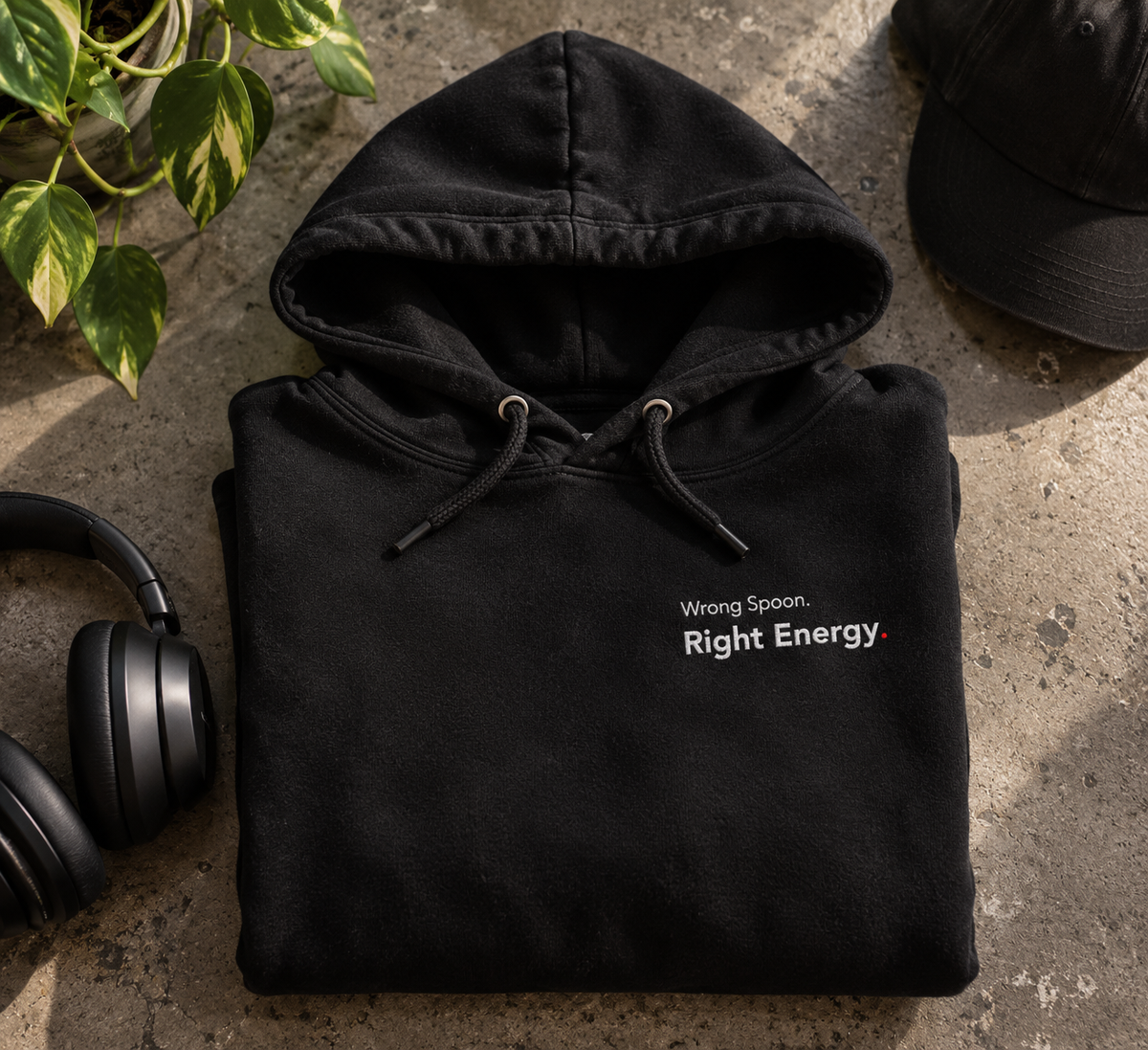 Black Wrong Spoon. Right Energy. embroidered hoodie folded flat