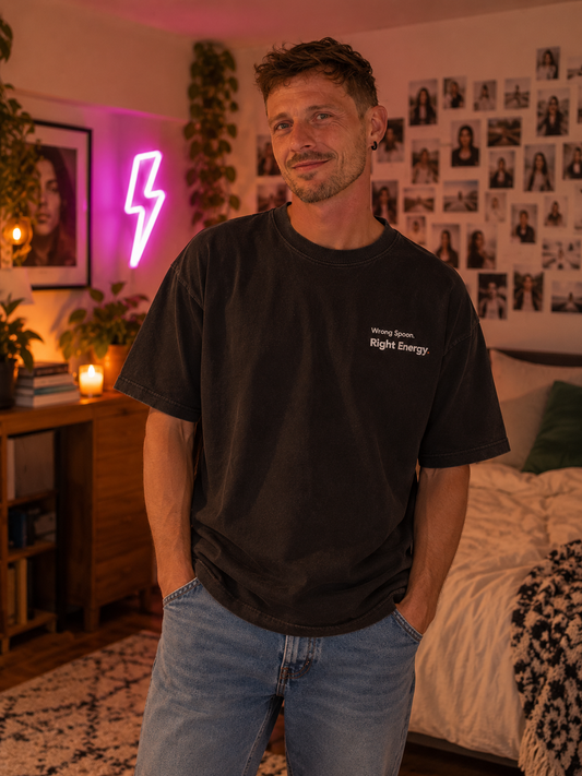 Man wearing the Wrong Spoon. Right Energy. embroidered oversized tee in Washed Black