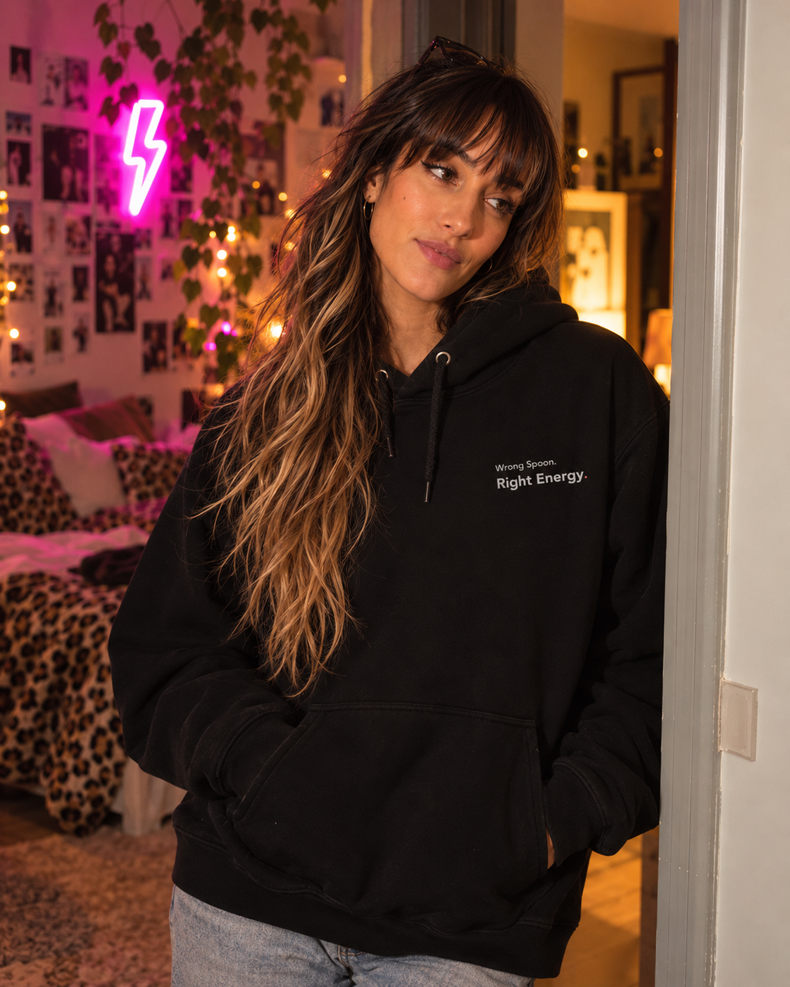 Woman wearing the Wrong Spoon. Right Energy. embroidered hoodie in Black