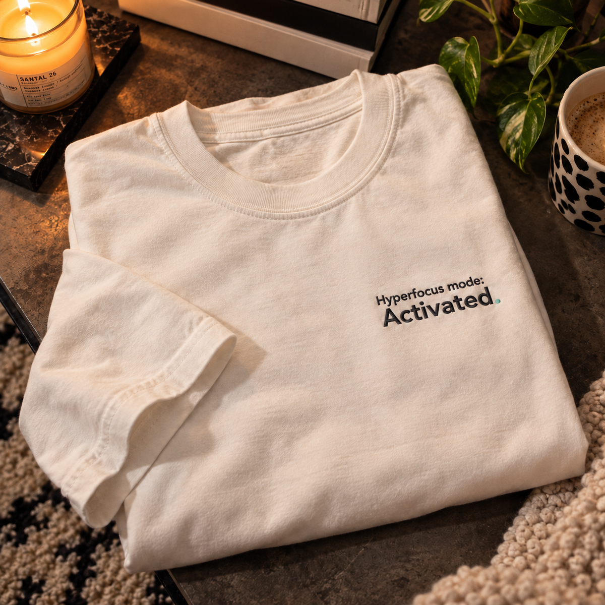 Hyperfocus mode: Activated. embroidered oversized tee in Vintage White, folded