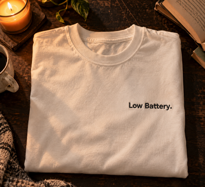 Low Battery. embroidered oversized tee in Vintage White, folded