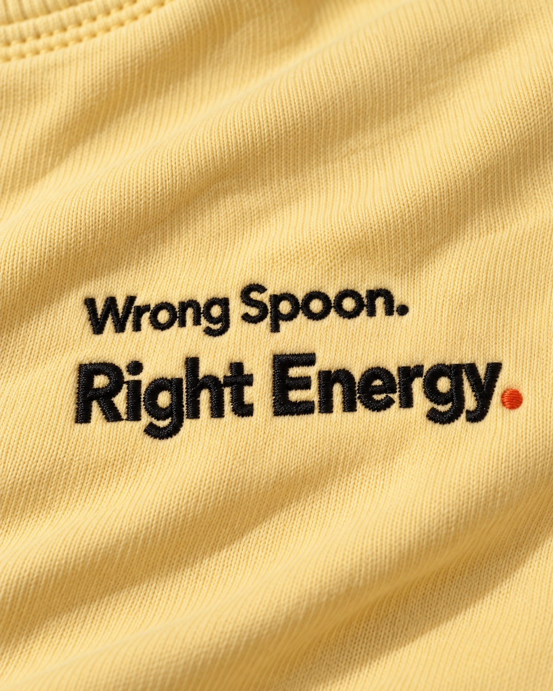 Close-up of the Wrong Spoon. Right Energy. embroidery on Butter fabric