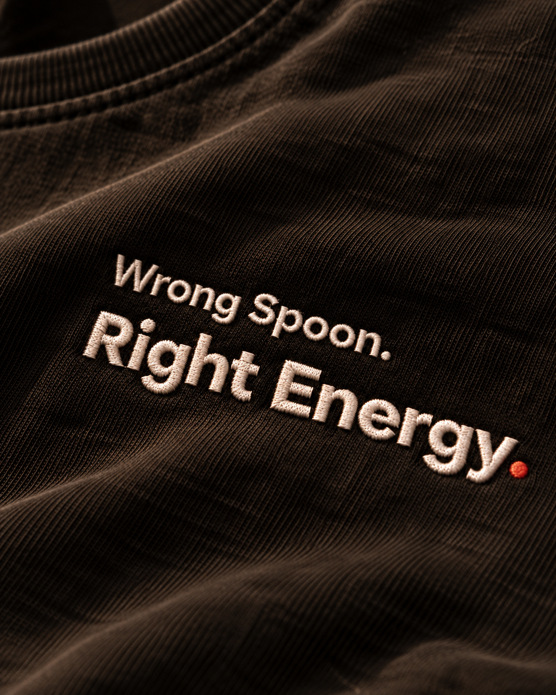 Close-up of the Wrong Spoon. Right Energy. embroidery on Washed Black fabric