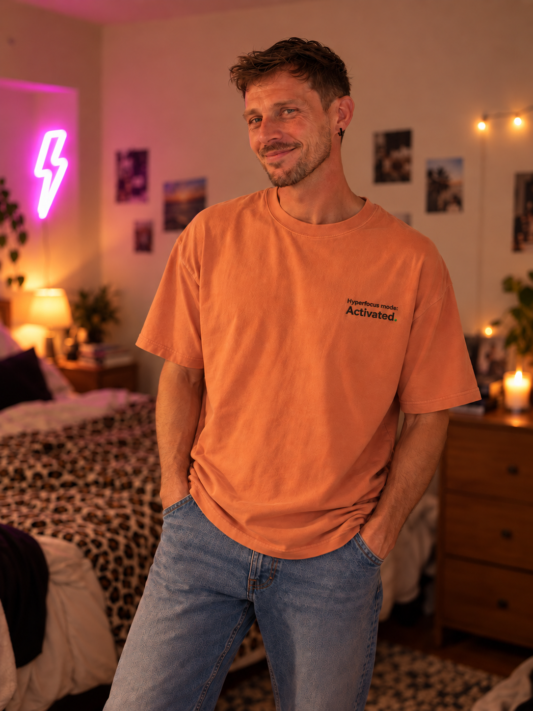 Man wearing the Hyperfocus mode: Activated. embroidered Pastel Pop tee in Terracotta