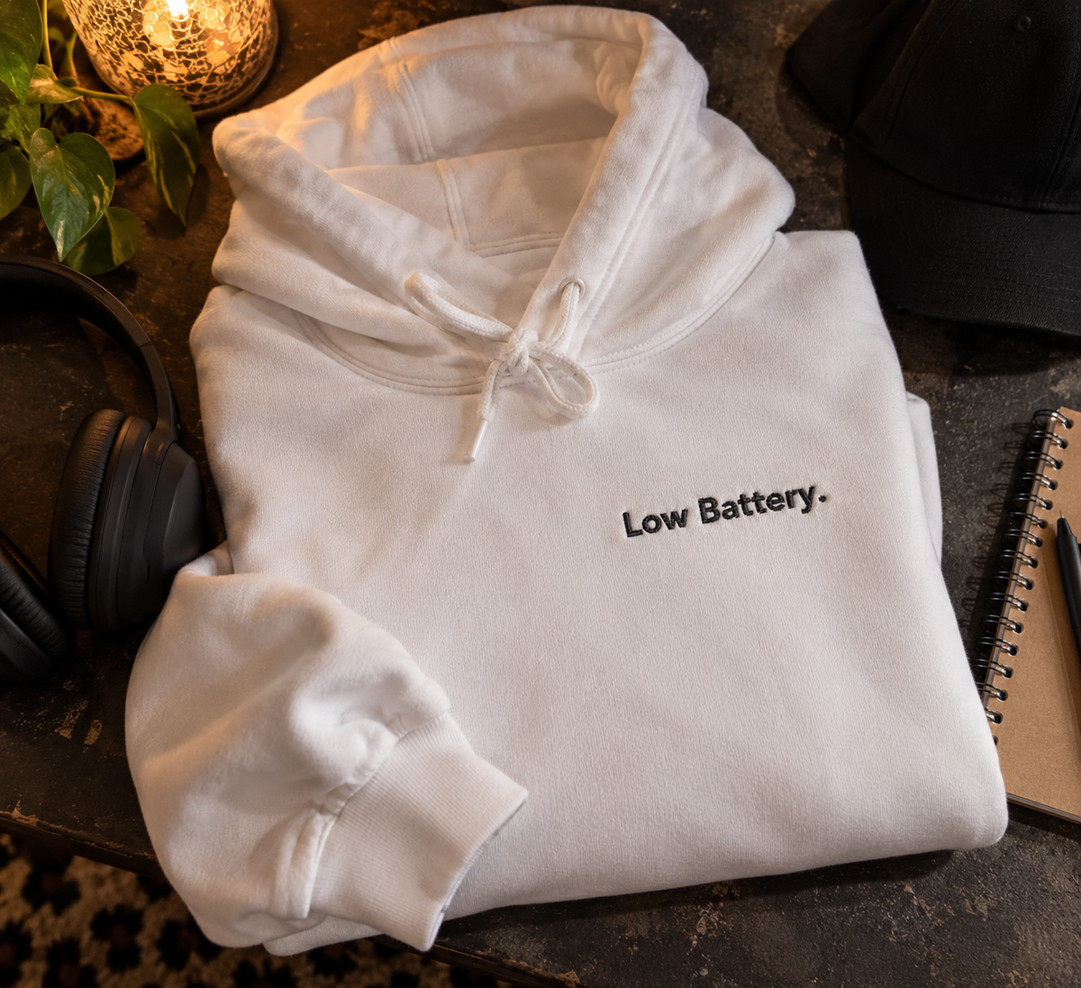 White Low Battery. embroidered hoodie folded flat